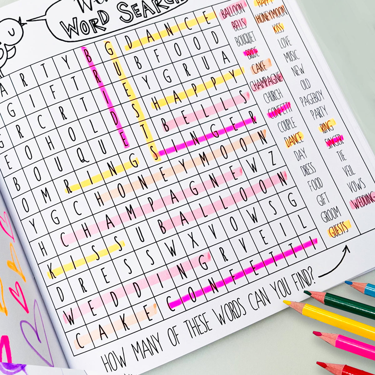 Wedding activity book page with fun wedding-themed puzzles and games for children