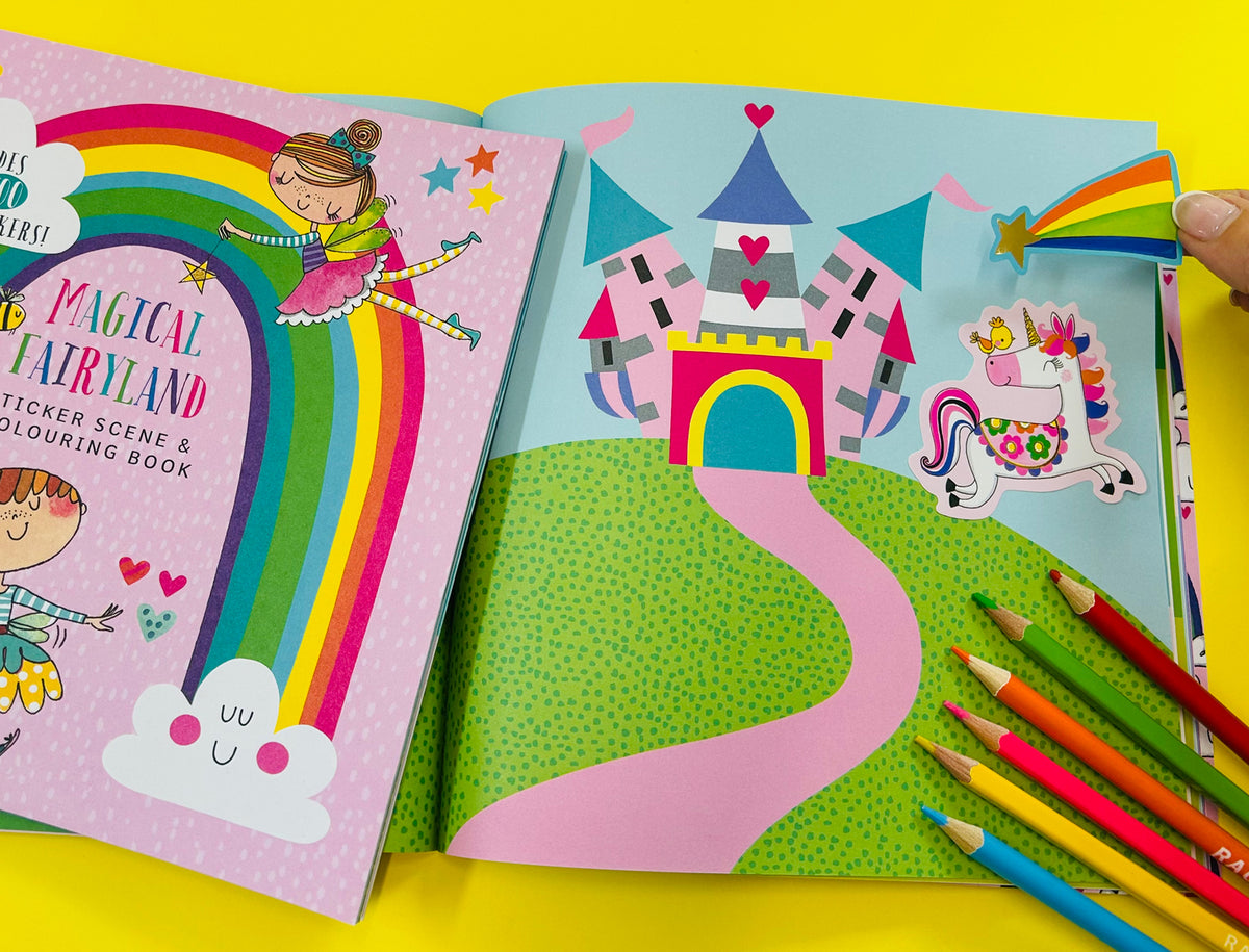 Rachel Ellen Designs 'Magical Fairyland' sticker scene and colouring book open to a colourful castle scene with a unicorn sticker and coloured pencils.