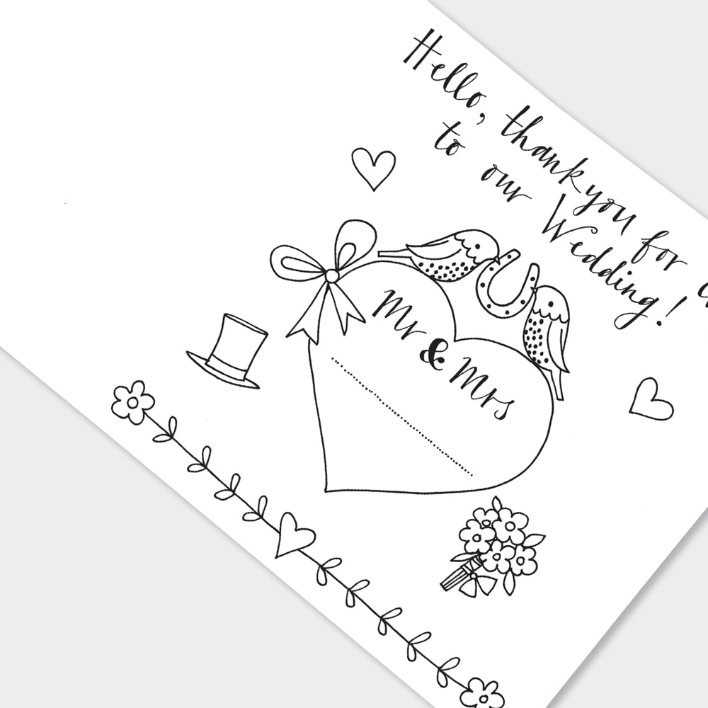 Inside page of wedding activity book showing colouring activities for young guests
