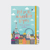 Travel planner and journal with rose gold foil cover and illustrated cityscape