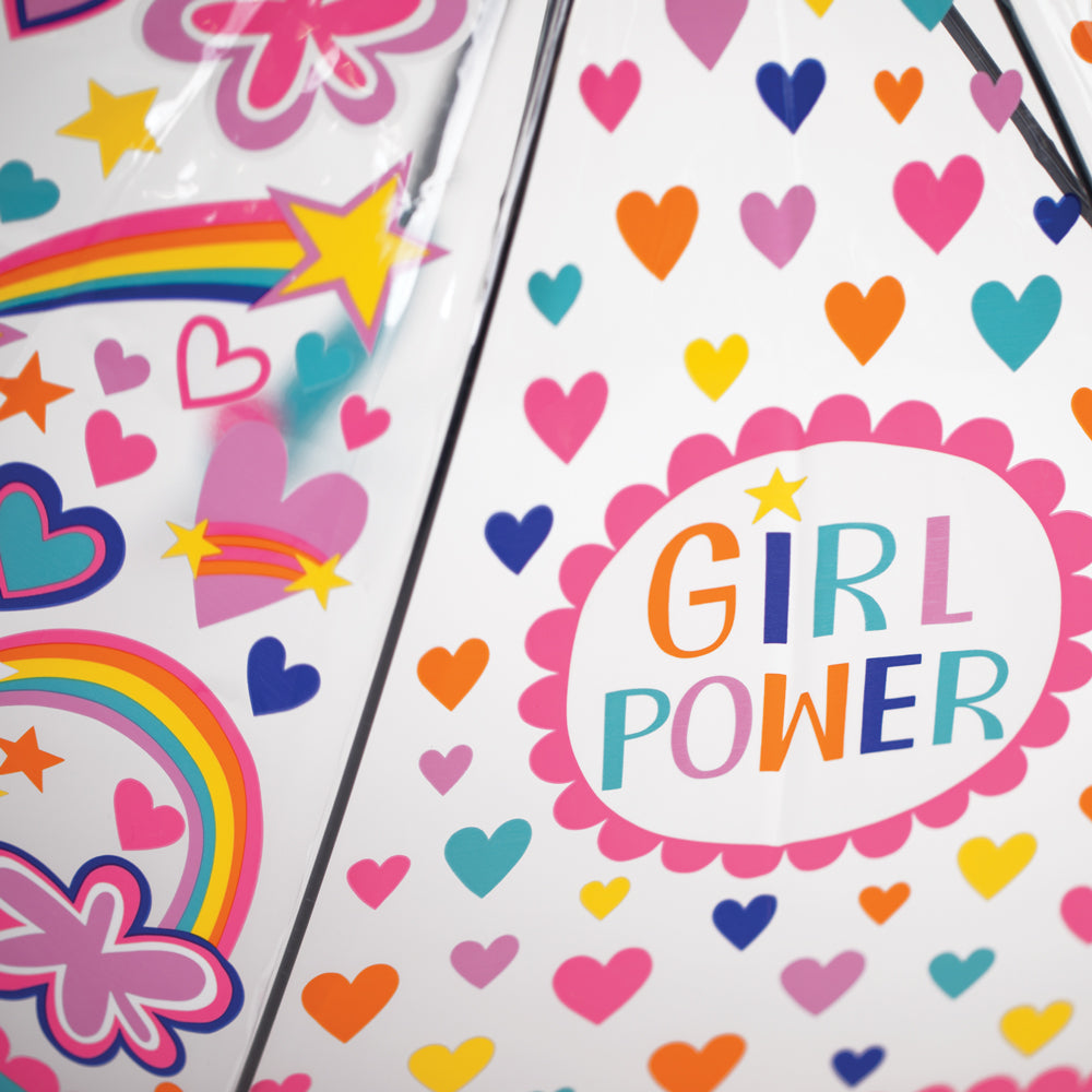 Close-up of girl power childrens umbrella featuring colourful hearts, clouds, stars.